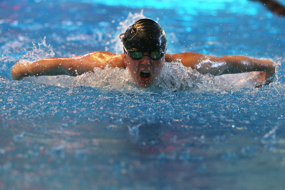 Keesee Bennett-McDonnell takes a breath during her leg of the 200-yard medley relay
